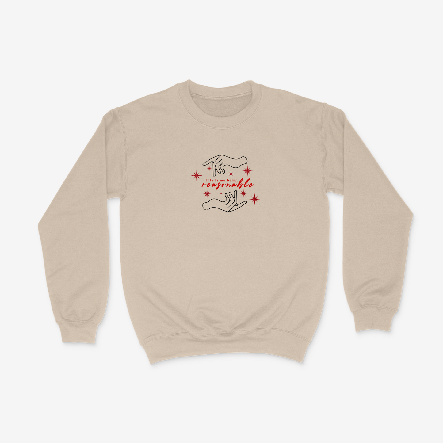 Beige crewneck sweater featuring hand design, sparkly red stars, and the phrase "This is me being resasonable" .